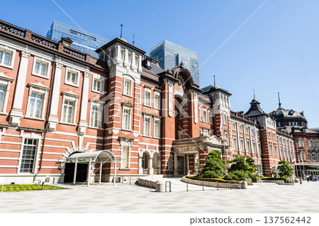 Building view of the Tokyo Station. It's a major inter-city rail terminal in Chiyoda, Tokyo, Japan. located in the Marunouchi business district.  137562442