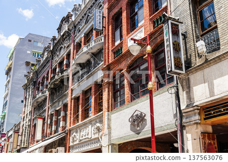 Low-angle view of old buildings in Dihua Street of Wanhua, Taipei City, Taiwan. Low-angle view of old buildings in Dihua Street of Wanhua, Taipei City, Taiwan. 137563076