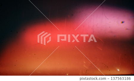 Abstract distressed film burn texture with warm light leak, scratches, dust Abstract distressed film burn texture with warm light leak, scratches, dust 137563186