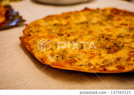 Homemade pizza on table close-up Italian style pizza Homemade pizza on table close-up Italian style pizza 137563525