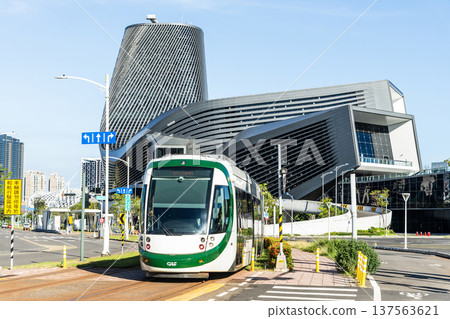 The circular light rail train drives past the Kaohsiung Port Cruise Terminal station in Taiwan. 137563621