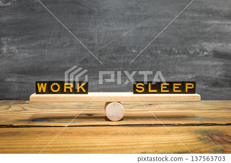WORK SLEEP Wooden Seesaw Illustrating Daily Time Allocation WORK SLEEP Wooden Seesaw Illustrating Daily Time Allocation 137563703