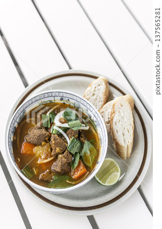 Bo Kho traditional vietnamese beef and vegetable stew on white table in da nang vietnam restaurant Bo Kho traditional vietnamese beef and vegetable stew on white table in da nang vietnam restaurant 137565281