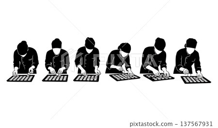 Black Solid Bakers Arranging Macarons Set of Six on White Background Black Solid Bakers Arranging Macarons Set of Six on White Background 137567931