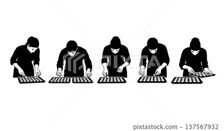 Black Solid Bakers Arranging Macarons Set of Six on White Background 137567932