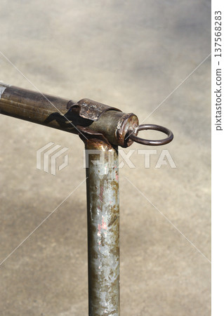Rusty Metal Railing Detail with Iron Ring Rusty Metal Railing Detail with Iron Ring 137568283