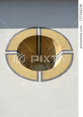 Circular architectural wall niche with decorative pattern 137568296