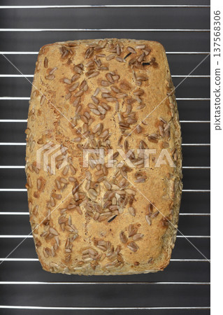 Top view of whole grain bread with sunflower seeds Top view of whole grain bread with sunflower seeds 137568306
