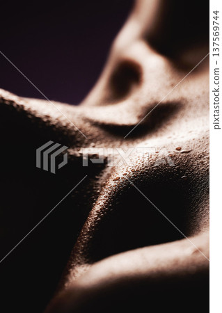 Skin, water and a body closeup in studio for beauty, wellness or feminine hygiene and care. Luxury, aesthetic and skincare with a person in the salon during sweat or hydration treatment for health Skin, water and a body closeup in studio for beauty, wellness or feminine hygiene and care. Luxury, aesthetic and skincare with a person in the salon during sweat or hydration treatment for health 137569744