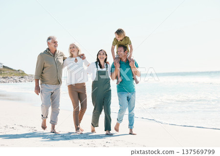 Walking, beach and family generations together on vacation, holiday or tropical weekend trip. Happy, travel and child with parents and grandparents bonding by ocean or sea on adventure in Australia. 137569799