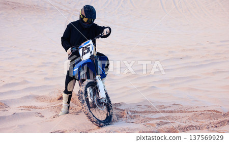 Sand, rally or athlete driving motorcycle for action, adventure or fitness with performance or adrenaline. Desert, sports or person on motorbike on dunes for training, exercise or race or challenge Sand, rally or athlete driving motorcycle for action, adventure or fitness with performance or adrenaline. Desert, sports or person on motorbike on dunes for training, exercise or race or challenge 137569929