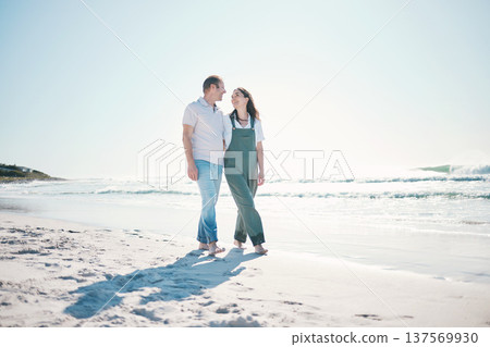 Beach, happy couple or walking in love on vacation, holiday or bonding in summer on mockup space. Smile, man or woman at ocean to travel, romance or healthy connection in relationship at sea together Beach, happy couple or walking in love on vacation, holiday or bonding in summer on mockup space. Smile, man or woman at ocean to travel, romance or healthy connection in relationship at sea together 137569930