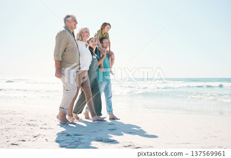 Walking, beach and big family together on vacation, holiday or tropical weekend trip with love. Happy, travel and child with parents and grandparents bonding by ocean or sea on adventure in Australia Walking, beach and big family together on vacation, holiday or tropical weekend trip with love. Happy, travel and child with parents and grandparents bonding by ocean or sea on adventure in Australia 137569961
