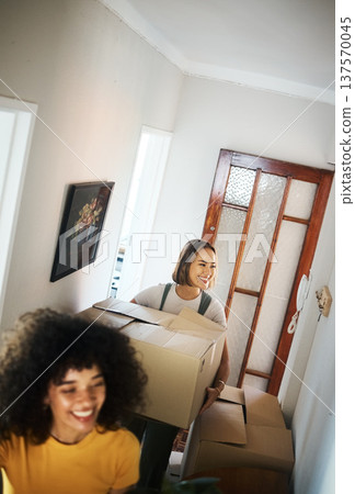 Lesbians, homeowners and boxes with couple, love and happiness with achievement, real estate or moving. Queer people, women or lgbtq with property, apartment or mortgage with marriage or relationship Lesbians, homeowners and boxes with couple, love and happiness with achievement, real estate or moving. Queer people, women or lgbtq with property, apartment or mortgage with marriage or relationship 137570045