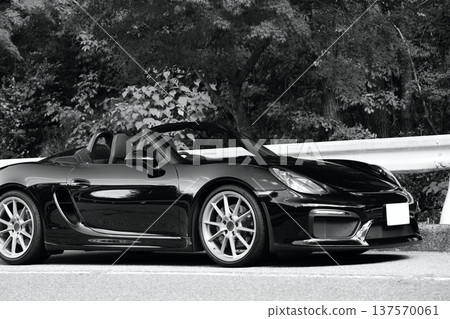 A glossy black open car 137570061