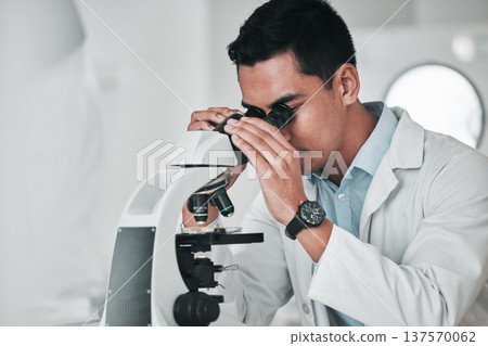 Man, scientist and microscope in forensic, research or new science discovery at laboratory. Male person, medical or healthcare specialist looking in scope for DNA, vaccine or cure to virus in lab 137570062