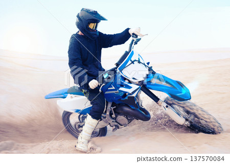 Dirt, motorbike and athlete driving in sports, adventure or man in desert, sand and riding outdoor on dune in nature. Extreme sport, bike or motorcycle drive with helmet, gear or person with freedom Dirt, motorbike and athlete driving in sports, adventure or man in desert, sand and riding outdoor on dune in nature. Extreme sport, bike or motorcycle drive with helmet, gear or person with freedom 137570084