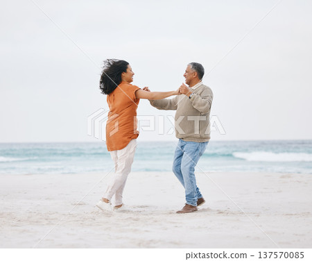 Beach, dance and senior happy couple love, fun date or care on travel holiday, retirement or nature vacation energy. Free dancer, ocean sea and elderly man, old woman and marriage people bond on sand Beach, dance and senior happy couple love, fun date or care on travel holiday, retirement or nature vacation energy. Free dancer, ocean sea and elderly man, old woman and marriage people bond on sand 137570085