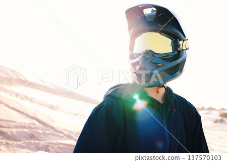Helmet, flare and an off road biker outdoor for a race, competition or adrenaline in summer. Freedom, energy and adventure with a sports rider on a course for power or speed in a reflective visor Helmet, flare and an off road biker outdoor for a race, competition or adrenaline in summer. Freedom, energy and adventure with a sports rider on a course for power or speed in a reflective visor 137570103