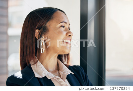 Thinking, happy and business woman by window for ideas, career opportunity and job in office. Professional, brainstorming and face of worker in workplace with confidence, ambition and success mindset 137570234