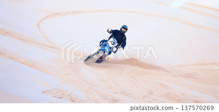Race, desert and a person on a bike for travel, extreme sport and adrenaline on a vacation. Sand, competition and a bike or racer for cycling, training or adventure for performance on a motorbike Race, desert and a person on a bike for travel, extreme sport and adrenaline on a vacation. Sand, competition and a bike or racer for cycling, training or adventure for performance on a motorbike 137570269