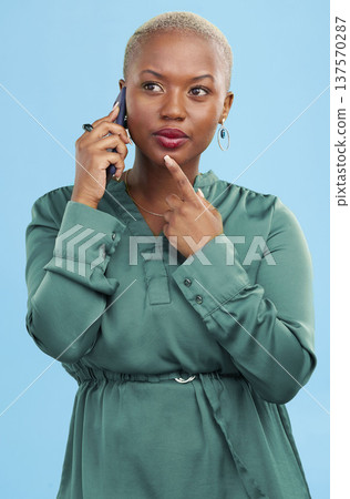 Phone call, thinking and black woman listening to news, discussion and talk to contact in studio isolated on a blue background. Idea, African person chat on smartphone conversation and communication Phone call, thinking and black woman listening to news, discussion and talk to contact in studio isolated on a blue background. Idea, African person chat on smartphone conversation and communication 137570287