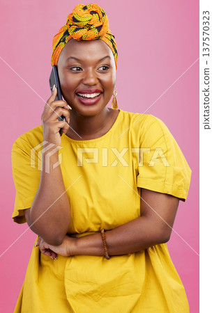 Black woman, phone call and communication in studio, happy with smile and smartphone with chat on pink background. Mockup space, funny conversation and VOIP with technology, networking and connection 137570323
