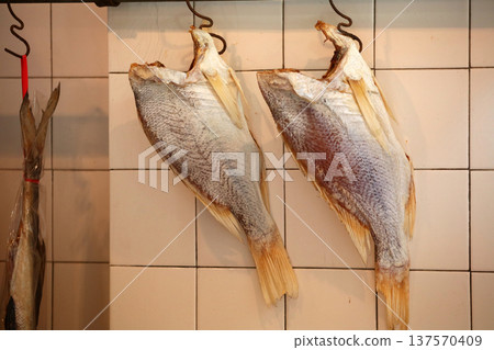 Salt-dried fish (ham yui) sold in Des Voeux Road West, Hong Kong. It resembles Kusaya and has a delicious smell. It used to be cheap, but now it's expensive Salt-dried fish (ham yui) sold in Des Voeux Road West, Hong Kong. It resembles Kusaya and has a delicious smell. It used to be cheap, but now it's expensive 137570409
