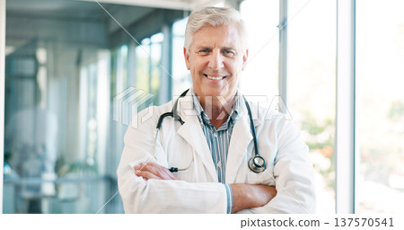 Doctor in portrait, senior man with arms crossed and healthcare, smile with confidence at hospital with pride and help. Medical professional, trust and expert at clinic with service and medicine Doctor in portrait, senior man with arms crossed and healthcare, smile with confidence at hospital with pride and help. Medical professional, trust and expert at clinic with service and medicine 137570541