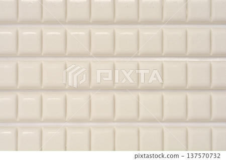 Close up of white adhesive mounting putty squares 137570732