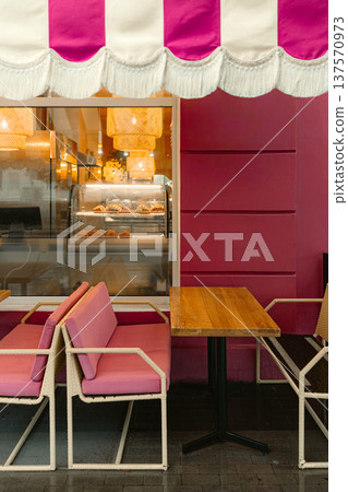 Pink Cafe Terrace with Warm Interior Lights Pink Cafe Terrace with Warm Interior Lights 137570973