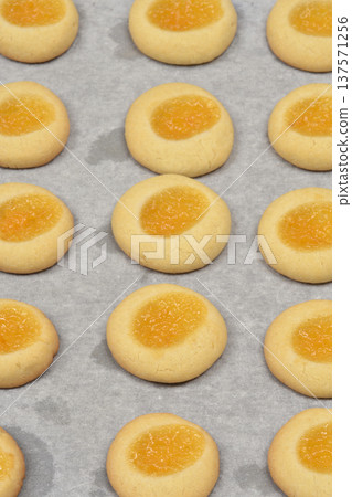 Baked lemon curd cookies on a tray 137571256