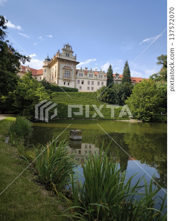 Scenic view of Pruhonice Castle in a sunny summer day with beautiful reflection in the pond, 137572070