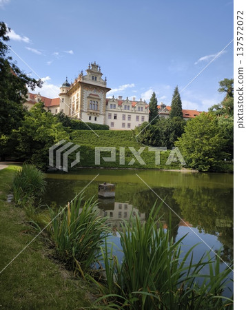 Scenic view of Pruhonice Castle in a sunny summer day with beautiful reflection in the pond, Scenic view of Pruhonice Castle in a sunny summer day with beautiful reflection in the pond, 137572072