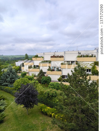 Modern terraced residential buildings with green gardens in Prague suburb, Czech Republic 137572090