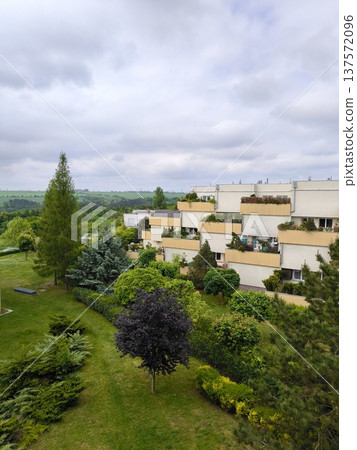 Modern terraced residential buildings with green gardens in Prague suburb, Czech Republic 137572096