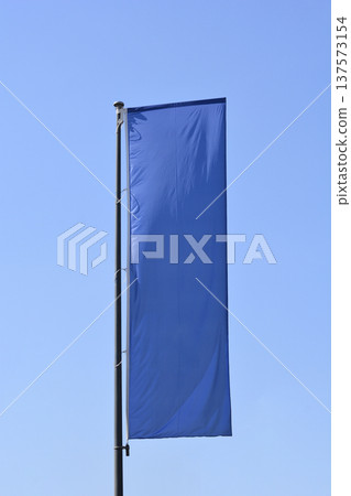 Blank Blue Vertical Banner on Flagpole Blank Blue Vertical Banner on Flagpole 137573154