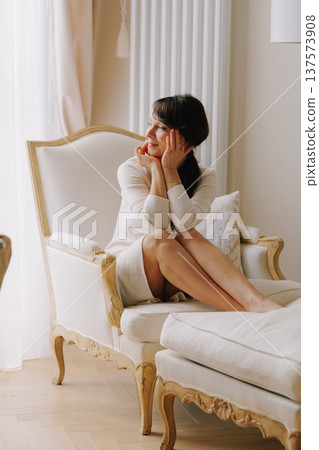 Mature woman smiling, looking away, reflecting, elegant portrait 137573908