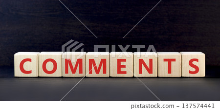 Comments comment word symbol. Concept word Comments on beautiful wooden blocks. Beautiful black background. Business support help comments comment word concept. Copy space. 137574441
