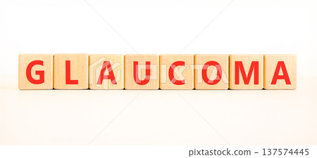 Glaucoma word symbol. Concept word Glaucoma on beautiful wooden blocks. Beautiful white background. Medical support help glaucoma word concept. Copy space. 137574445