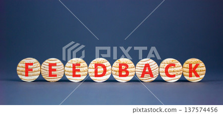 Feedback word symbol. Concept word Feedback on beautiful wooden circles. Beautiful grey background. Business support help feedback word concept. Copy space. 137574456