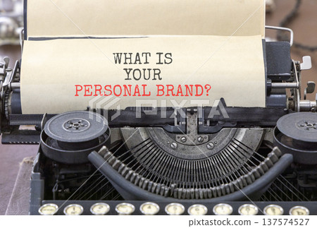 What is your personal brand symbol. Concept words What is your personal brand typed on old retro typewriter. Beautiful white paper background. Business what is your personal brand concept. Copy space. 137574527