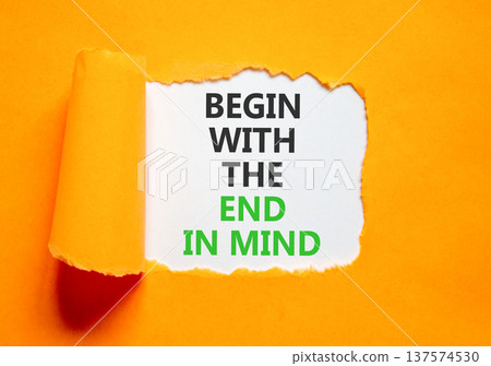 Begin with the end in mind symbol. Concept words Begin with the end in mind on beautiful white paper. Beautiful orange paper background. Business begin with the end in mind concept. Copy space. 137574530