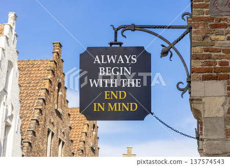 Begin with the end in mind symbol. Concept words Always begin with the end in mind on beautiful black road sign. Beautiful blue sky background. Business begin with the end in mind concept. Copy space. Begin with the end in mind symbol. Concept words Always begin with the end in mind on beautiful black road sign. Beautiful blue sky background. Business begin with the end in mind concept. Copy space. 137574543