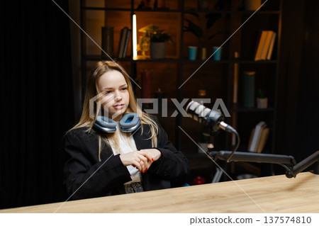 Radio host speaking during a podcast recording session Radio host speaking during a podcast recording session 137574810