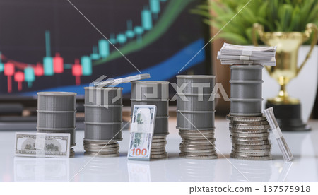 Growing Oil Barrel Stacks with Money and Bullish Market Chart Growing Oil Barrel Stacks with Money and Bullish Market Chart 137575918