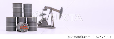 Oil Barrels with oil derrick on White Background 137575925