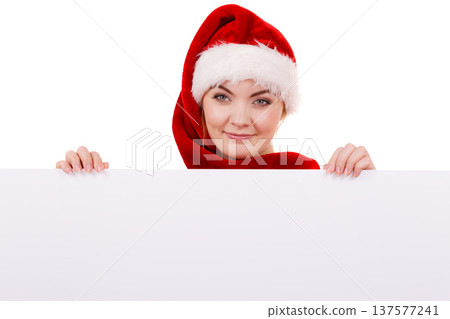Woman with blank empty banner board. Christmas 137577241