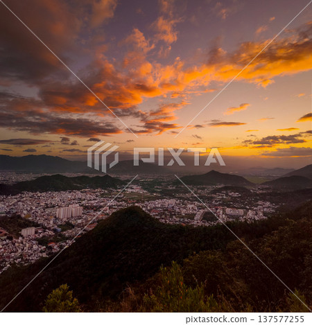 Panoramic sunset view of Nha Trang city from mountain viewpoint Vietnam 137577255