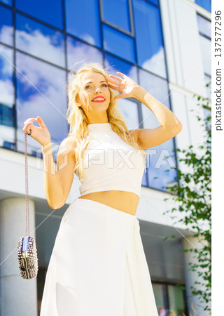 Woman wearing crop top and culottes Woman wearing crop top and culottes 137577296